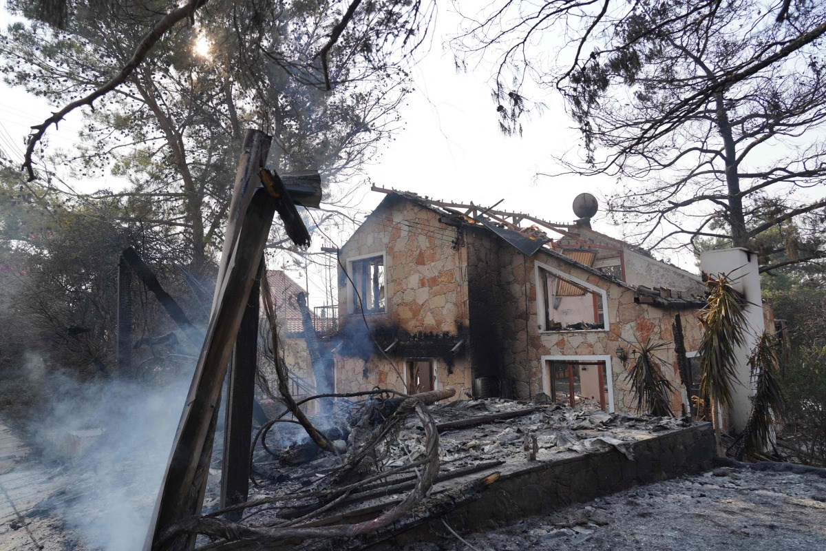 Two dead as Cyprus battles wildfire in searing heat