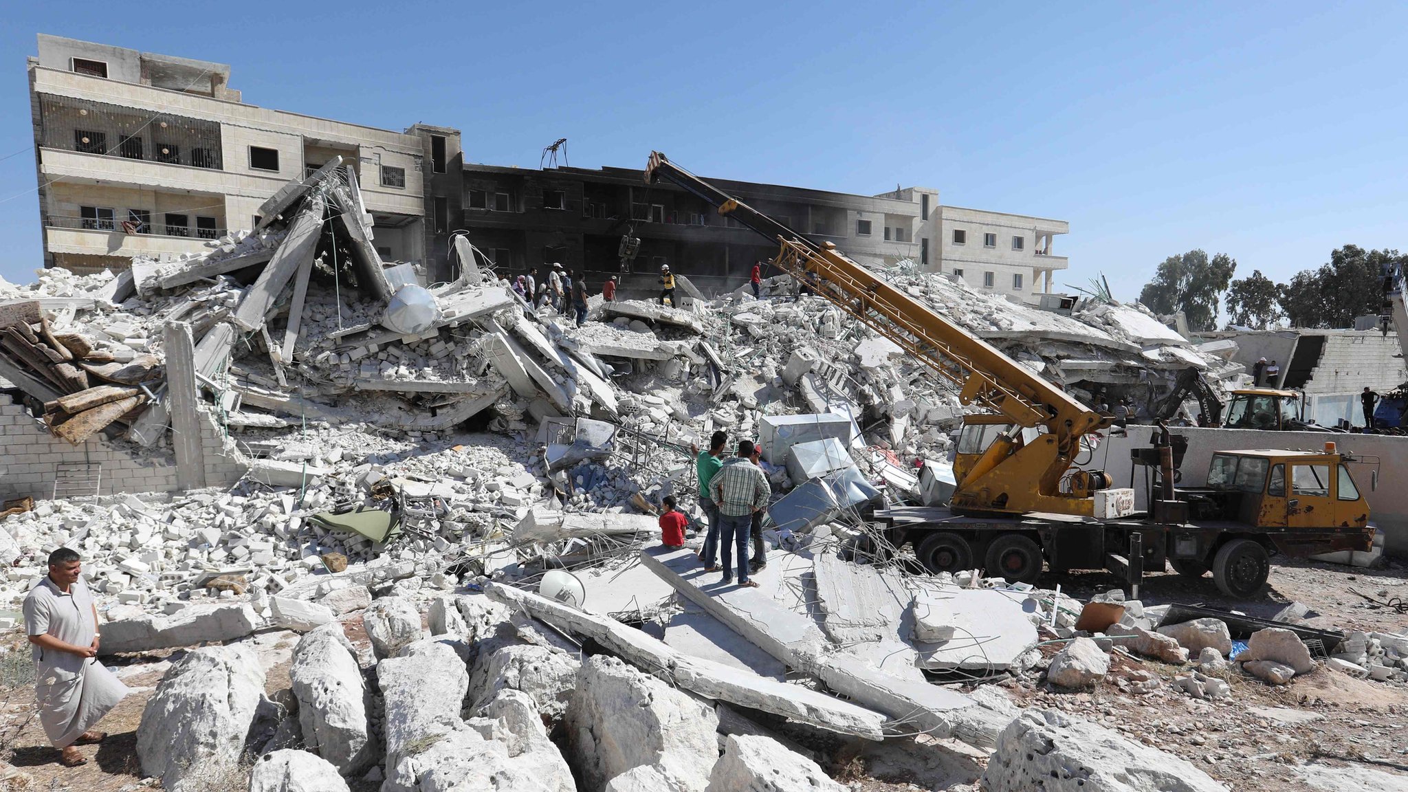 Syria arms depot blasts kill 12, wounds more than 100: monitor