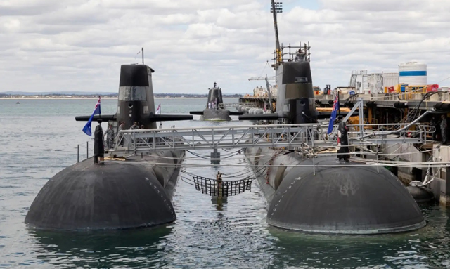 UK, Australia back embattled submarine deal with US
