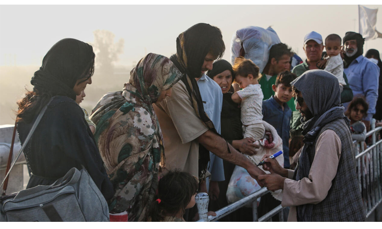 Afghans show solidarity as migrant returns from Iran surge