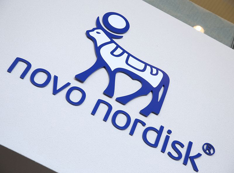 Novo Nordisk cuts earning forecasts again, names new CEO