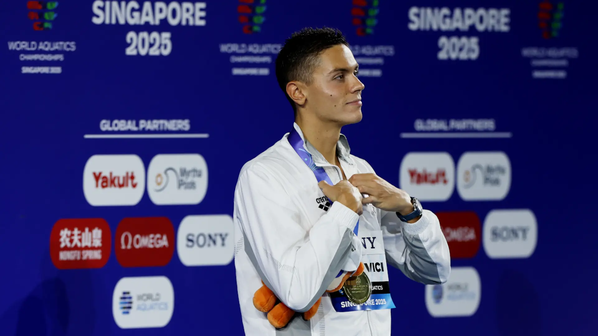 Popovici wins 100m freestyle world gold for sprint double