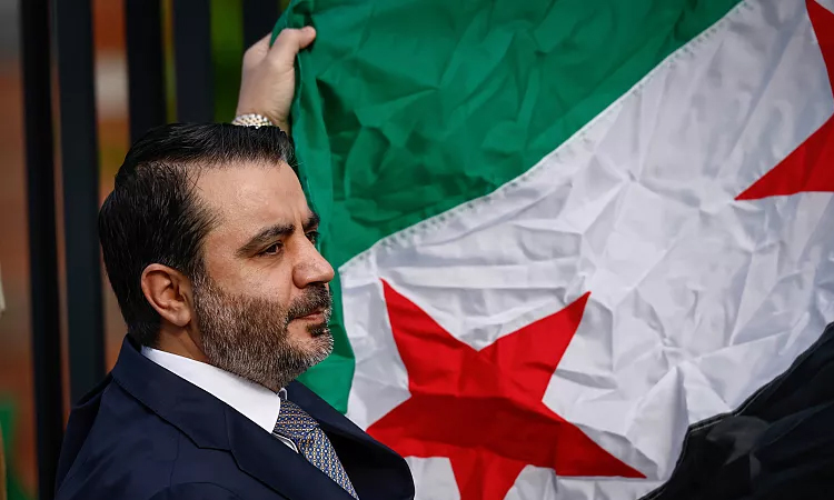 Syrian president says unifying country 'should not be with blood'