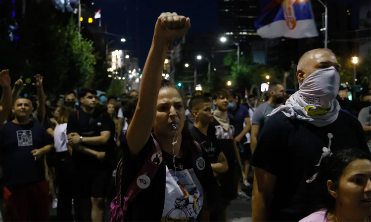 Serbian protesters attack ruling party headquarters in Belgrade
