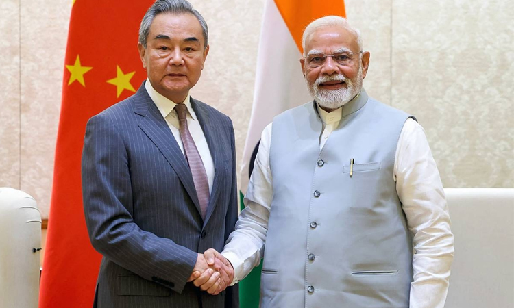 China, India pledge to resume flights as Beijing's top diplomat wraps up visit