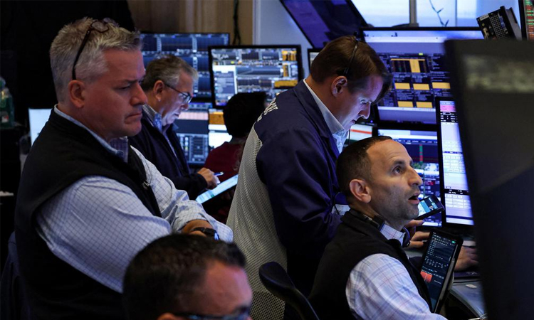 Wall Street mostly down as tech still under pressure