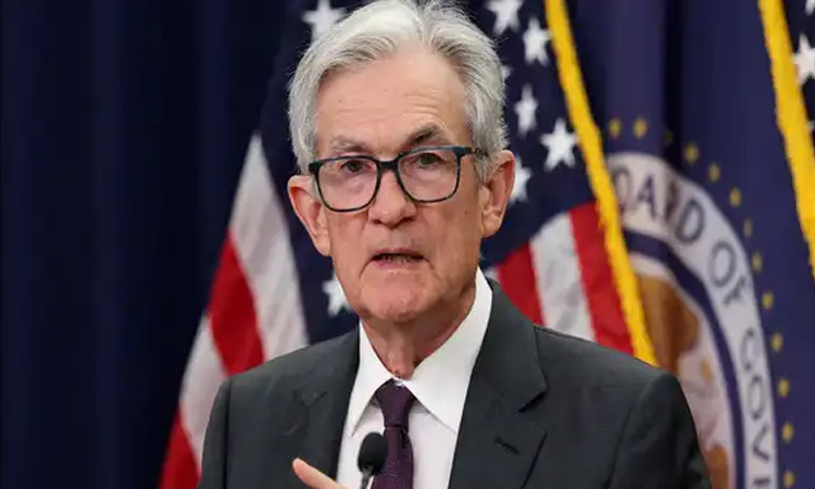 Wall Street rallies, dollar drops as Fed chief fuels rate cut hopes
