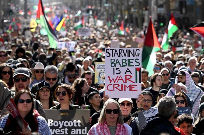 UK vows to speed up asylum claims as hotel protests spread