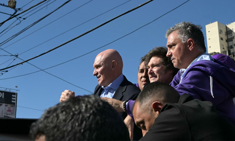 Argentina's Milei pelted with stones on campaign trail
