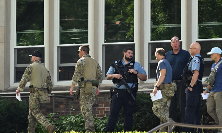 Motive probed for US shooting that killed two children, injured 17