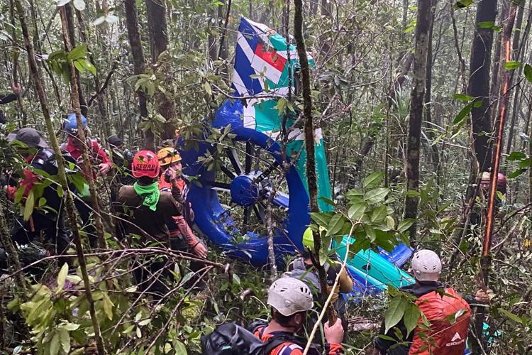 ndonesia rescuers find body near missing helicopter crash site