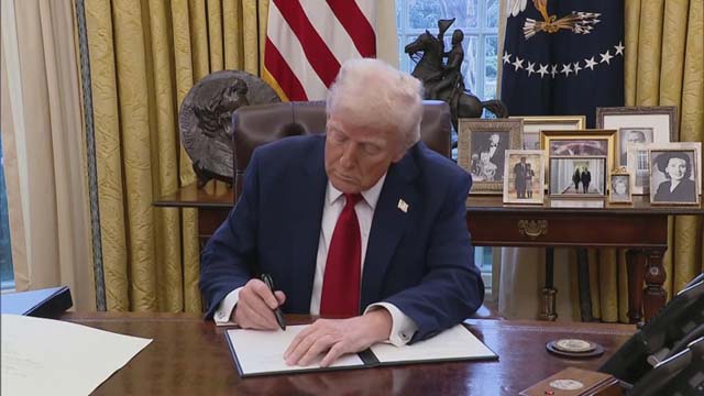 Trump signs order to lower US tariffs on Japan autos to 15%