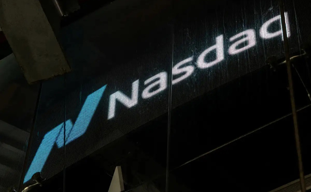 Nasdaq ends at record as markets eye interest rate relief