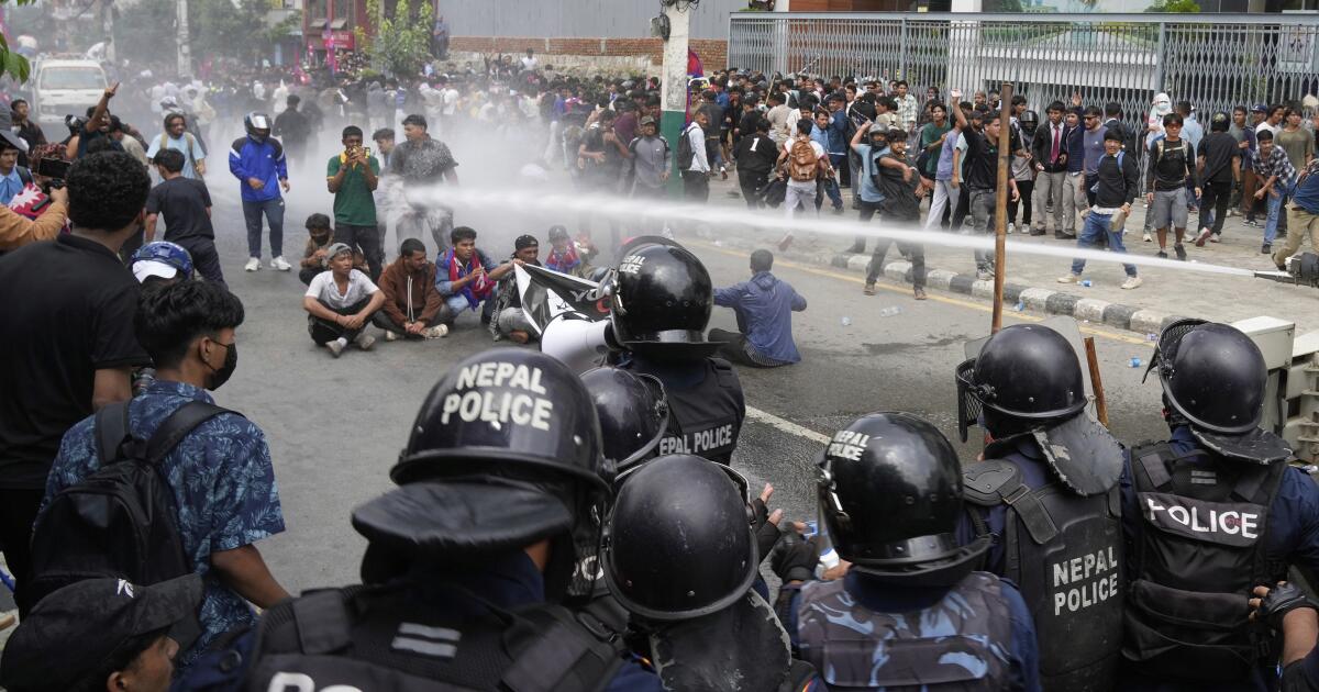 Nepal protesters set fire to parliament building: spokesman