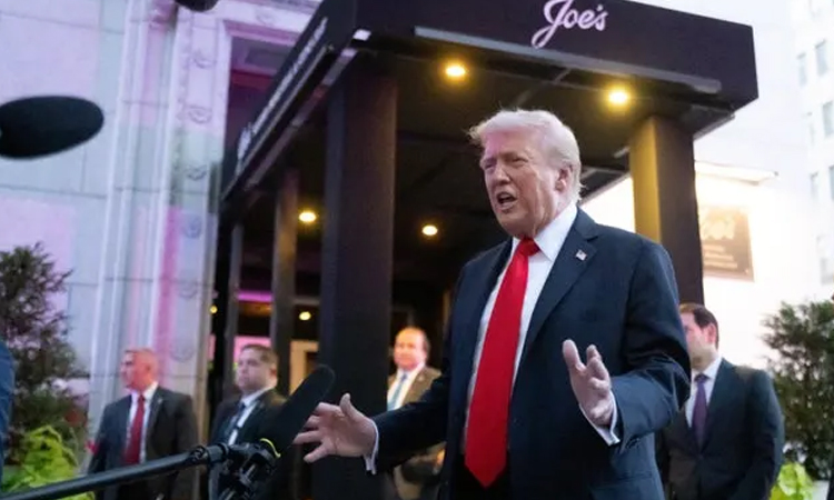 Trump jeered at Washington restaurant, called 'Hitler of our time'
