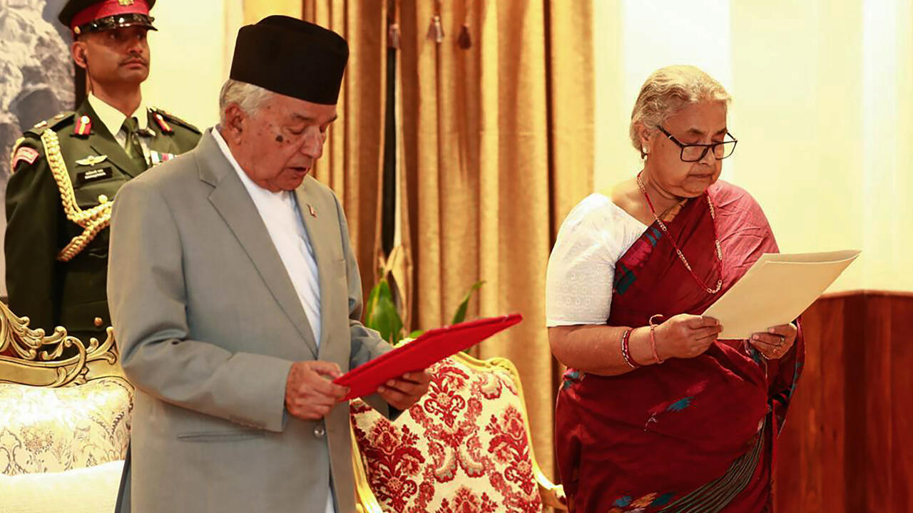 Nepal returns to calm as first woman PM takes charge
