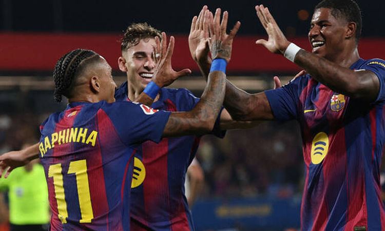 Champions Barca crush Valencia at training ground stadium