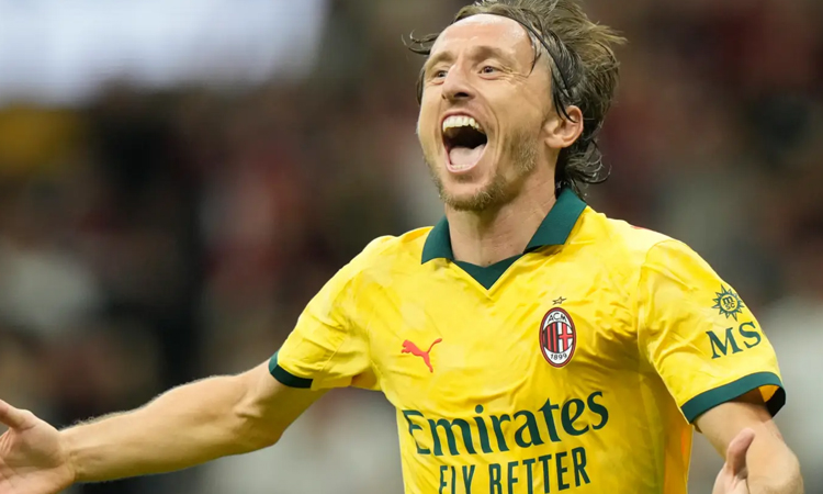 Modric opens AC Milan account with winner against Bologna