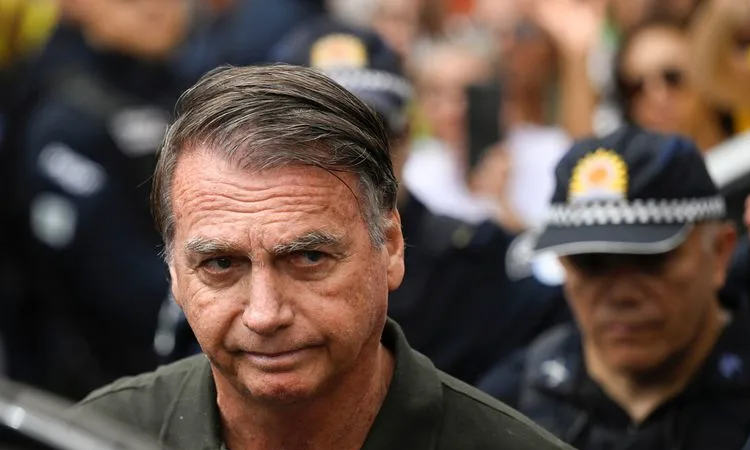 Brazil's Bolsonaro to spend night in hospital after falling ill