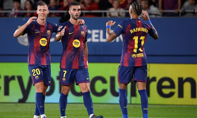 Barca ease to Getafe win, Atletico held after missed penalty