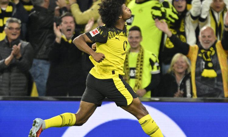Adeyemi sends Dortmund past Wolfsburg, Burke hat-trick stuns flat Frankfurt