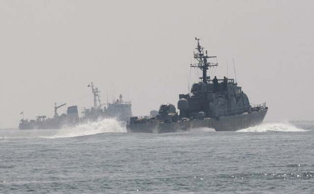 South Korea fires warning shots after boat from North enters waters