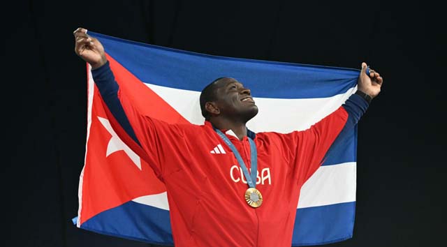 Wrestling legend Lopez calls for Cuban sport to 'open up' to the world