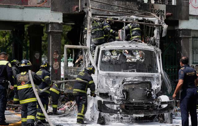 Mexico City military barracks targeted in protest over student disappearances