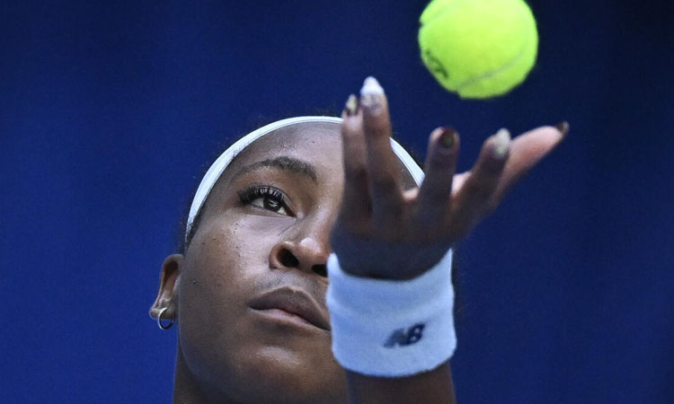 Gauff digs deep to keep China Open title defence alive