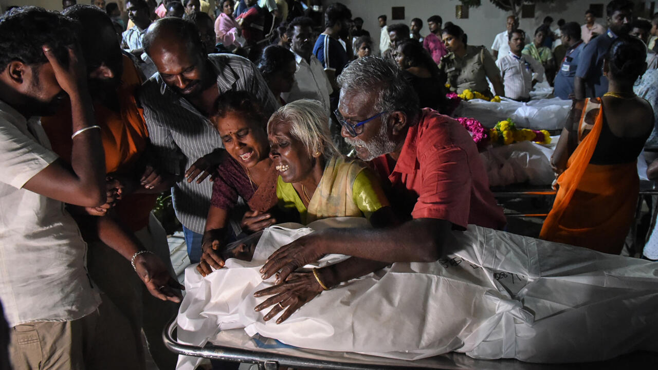 Indian actor-politician's aides charged after rally stampede kills 40
