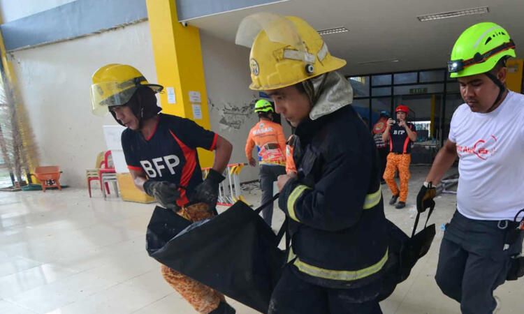 Strong quake in central Philippines kills 31 as search ongoing