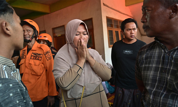 Rescuers search for 59 people trapped under collapsed Indonesian school