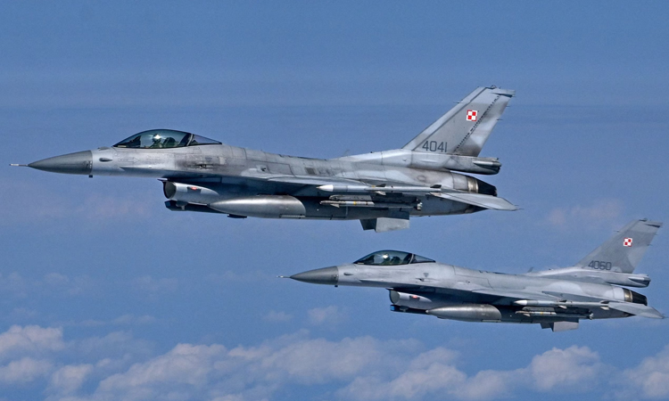 Ukraine says Russian strikes kill 1, Poland scrambles jets