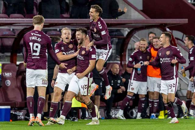 Hearts go five points clear after late derby win over Hibs