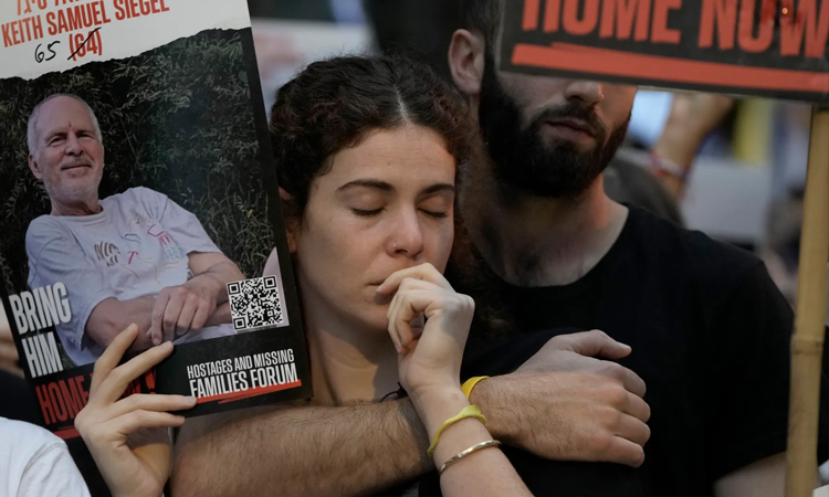 Families hold moment of silence for Oct 7 victims at Israel festival site: AFP