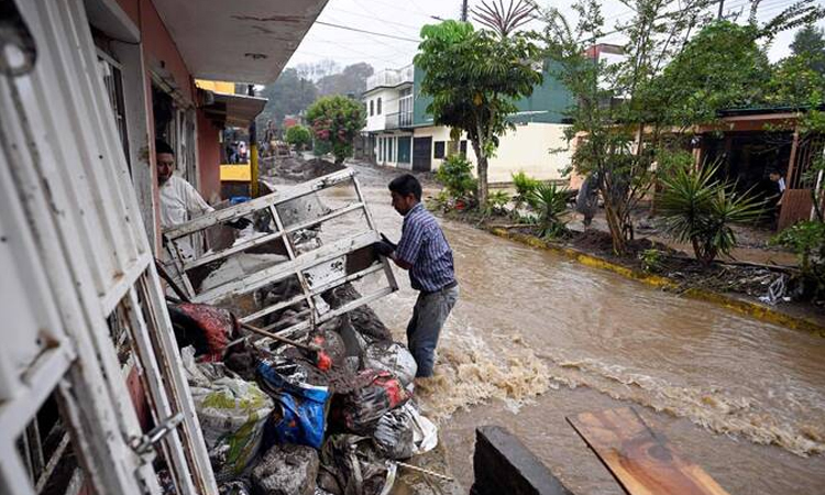 In minutes, Mexico's rains swept away homes and people