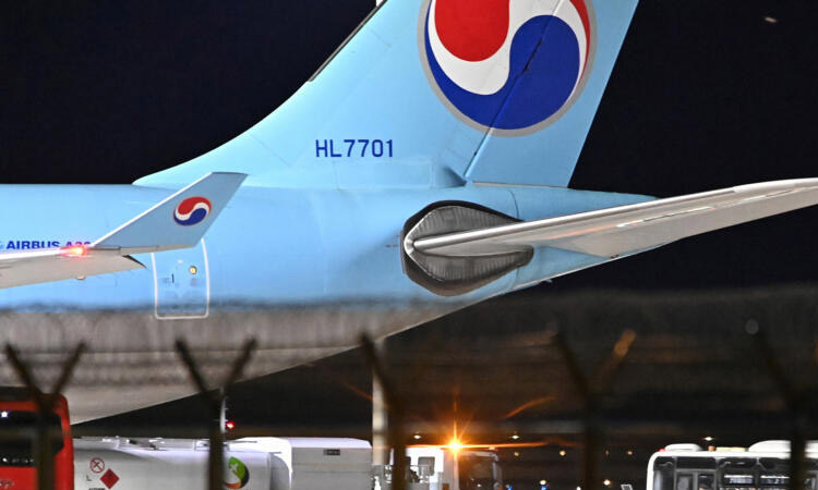 64 South Koreans held in Cambodia return home under arrest