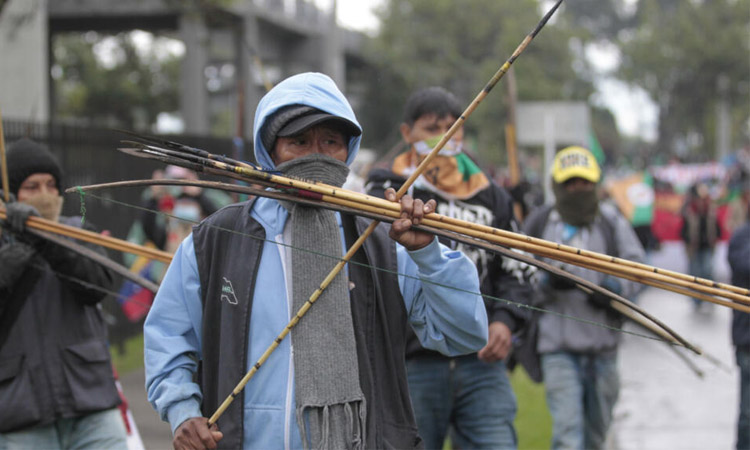 Anti-Trump protesters fire arrows at Colombian police, injuring four