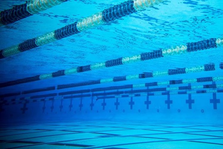 Mithun emerges champion in swimming