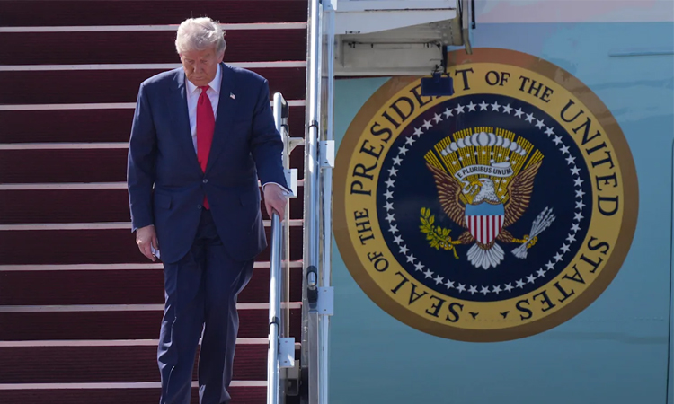 Troops, trade and 'hot' trucks: Trump descends on Japan