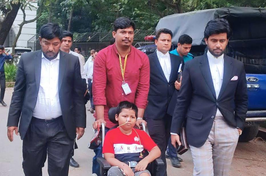 Father breaks down in court recalling police bullets that killed mother, maimed son