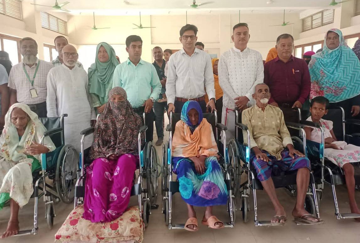 Wheelchairs distributed among the disabled in Tangail