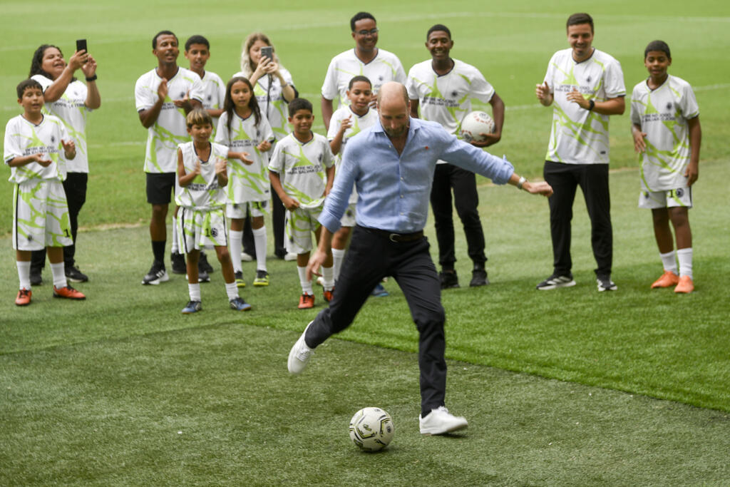 Prince William plays football with Brazilian pro on climate trip