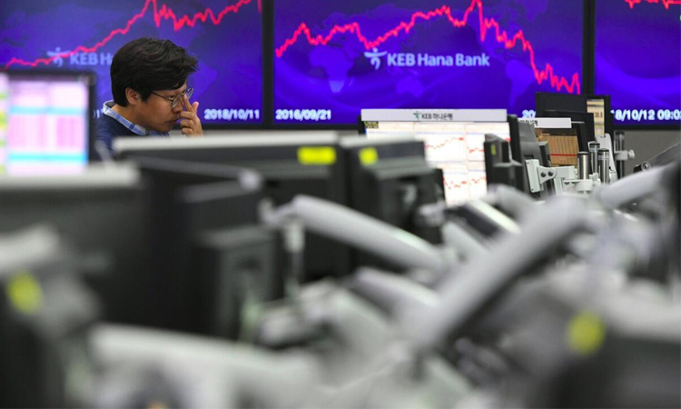 Asian markets tumble as tech bubble fears grow