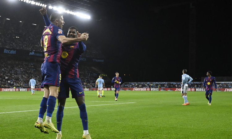 Lewandowski treble helps Barca beat Celta, cut gap on Real Madrid