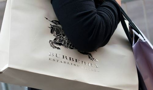 Burberry narrows first half loss on turnaround plan