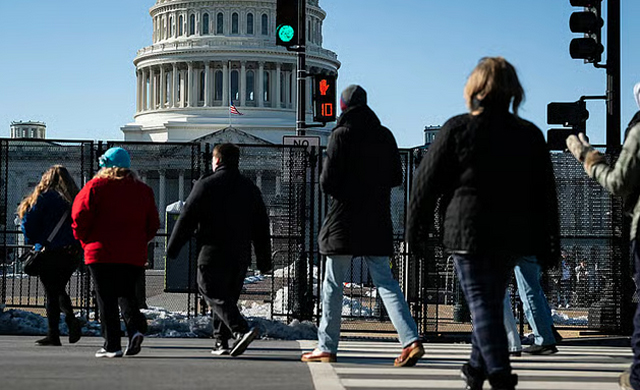 'Hope it won't happen again': US federal workers return post-shutdown