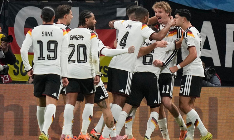 Germany and Netherlands lock up World Cup spots in style