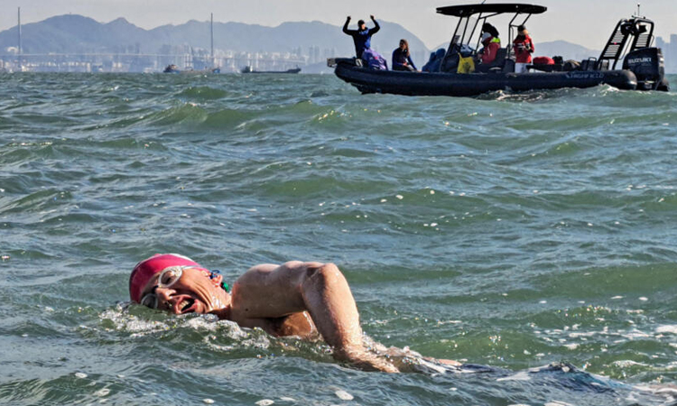 Delirium, painkillers: swimmers conquer Hong Kong seas over 21 hours