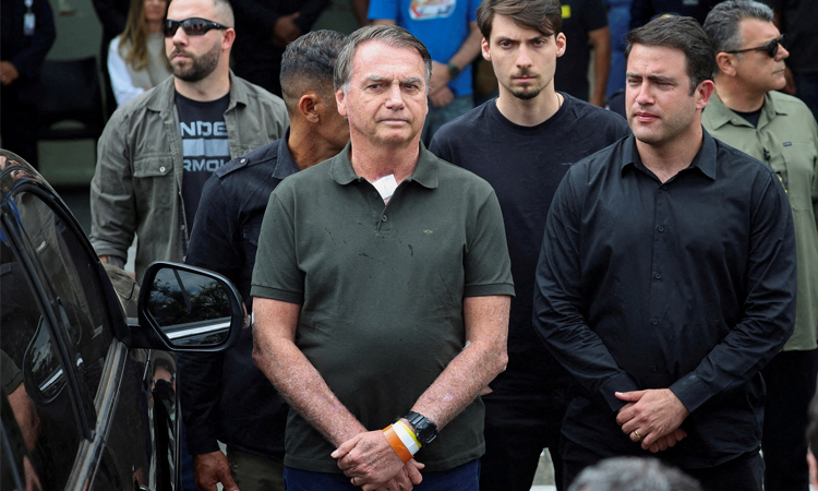 Brazil's Bolsonaro begins 27-year jail term for coup bid
